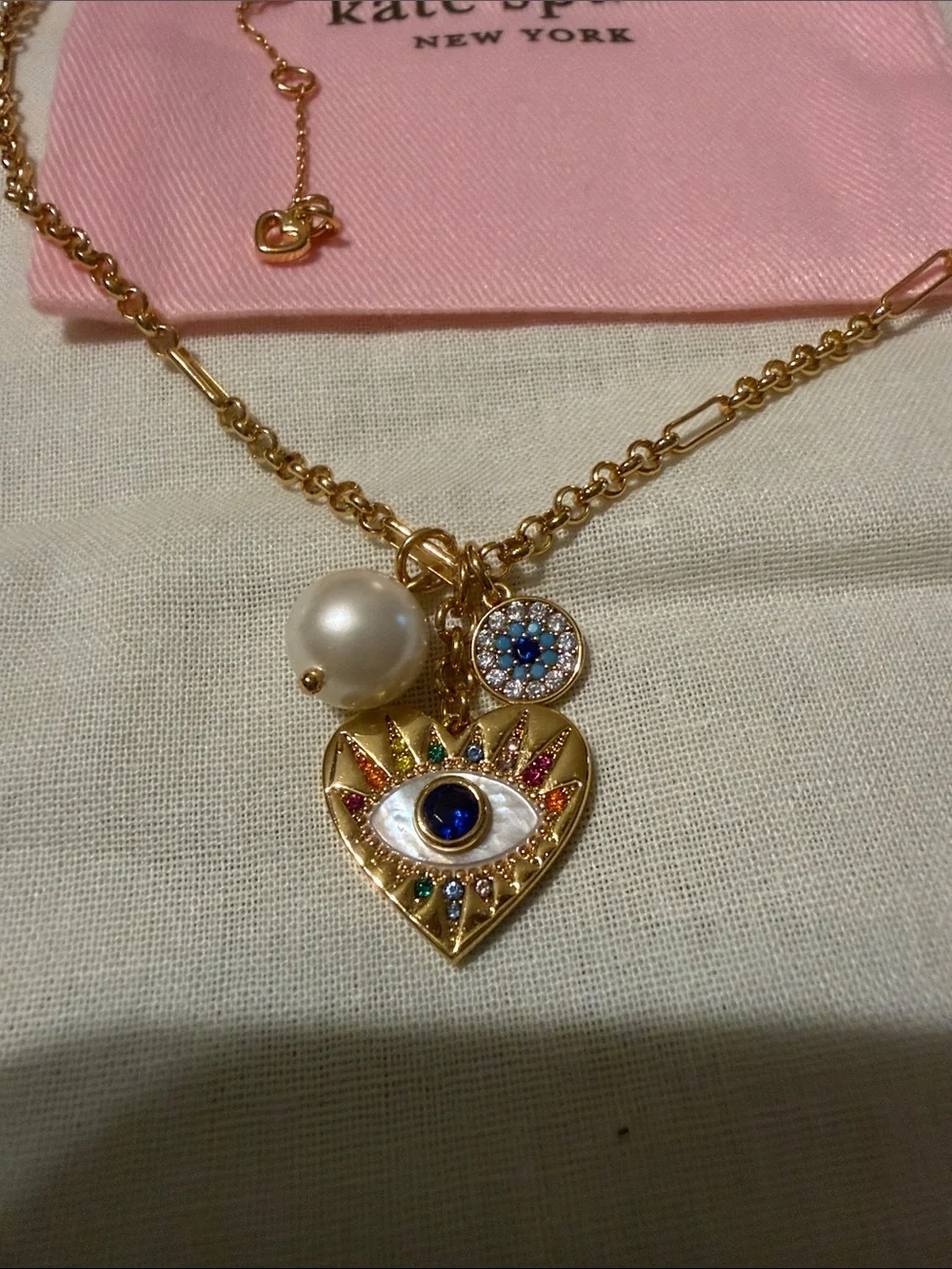 kate spade Gold-Tone Evil Eye Heart Necklace with Pink Pouch